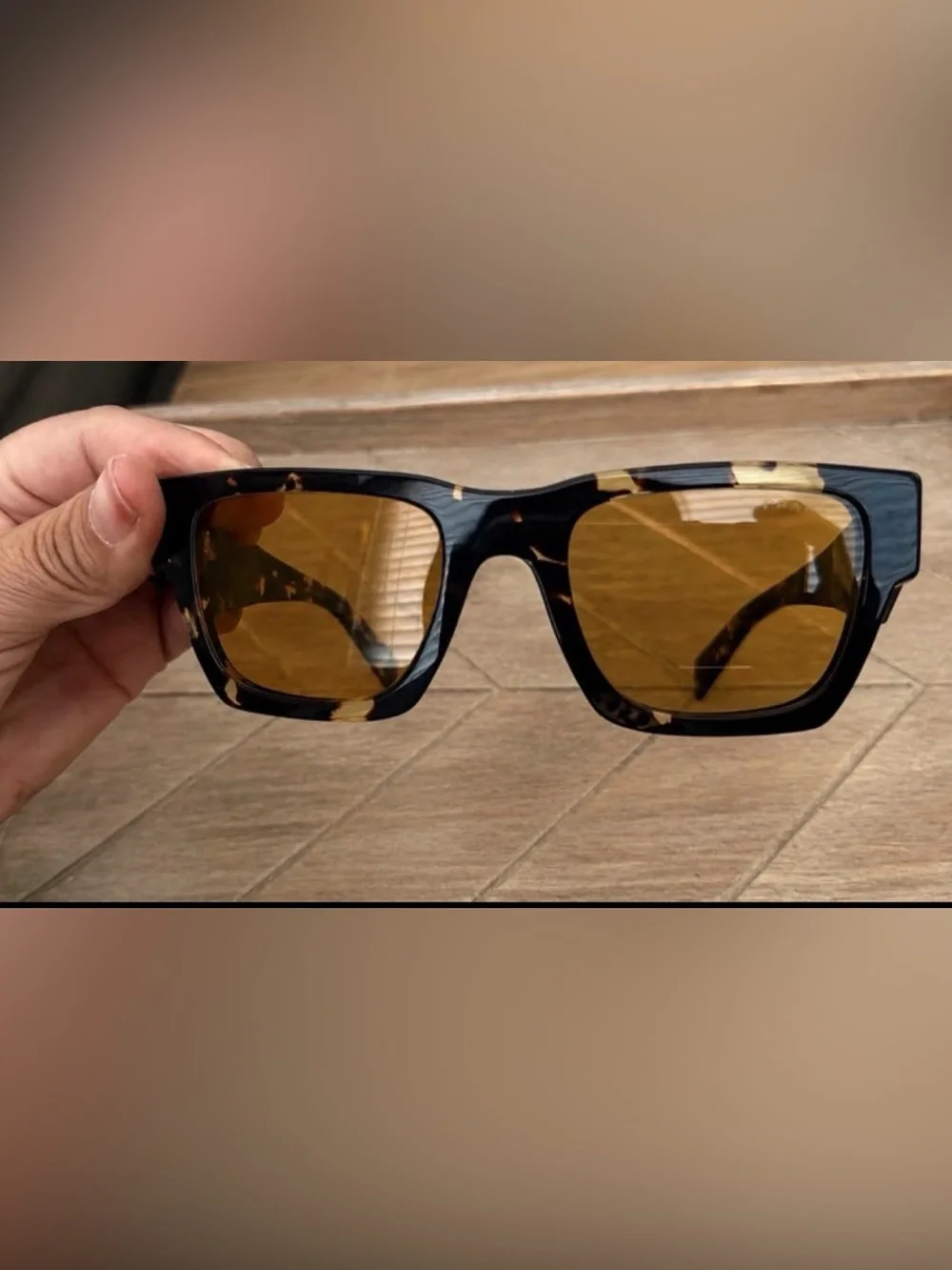 Prada Men's Black Tortoiseshell Sunglasses with Amber Lenses